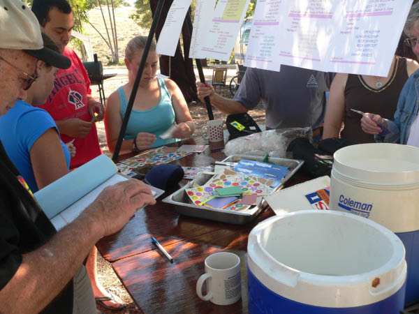 Patrol Activities.  This year was "The Camp Your Mother Wouldn't Send You To," so we had patrol assignments and activiteis and the like.  Here we're making tags for our "water bottle" holders.
