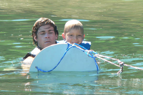 Alex prepares to get on the horseshoe ski.