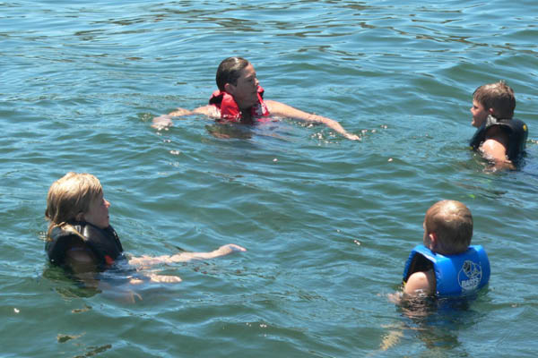Katherine, Janine, Nicholas, and Alex enjoy a dunk