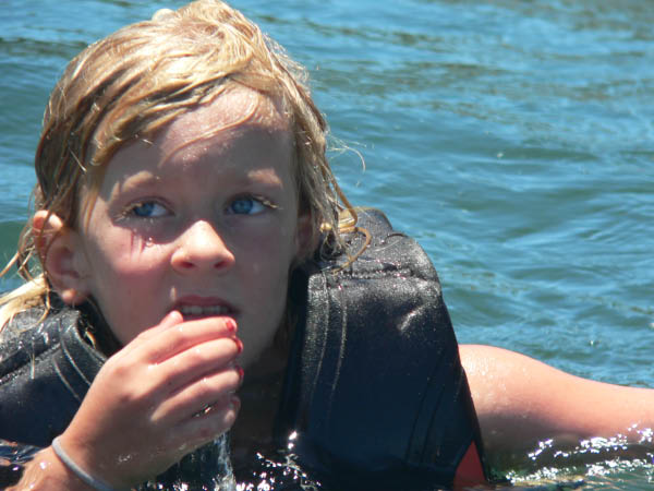 Katherine wonders, "Does this swim suit make me look uncute?"