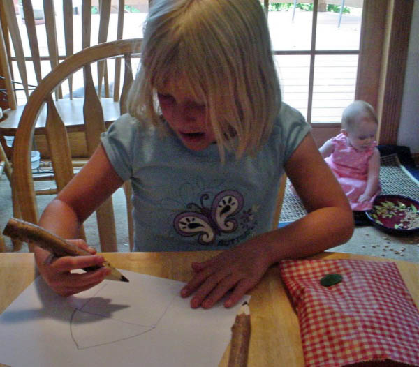 Katherine and Kaylee amuse themselves in their own way