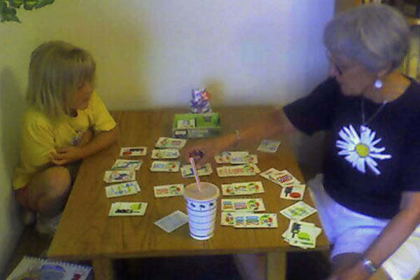 Katherine and Gloria occupy themselves after lunch with Nona.
