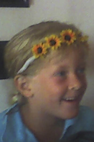 Katherine and her "May Pole" head dress.  I just love that smile.