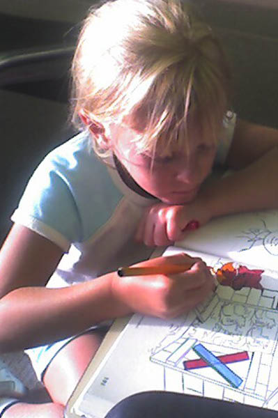 Katherine coloring at the airport