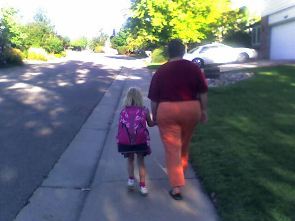 Margie escorts Katherine up to the bus stop ...