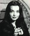 Carolyn Jones as Morticia Addams